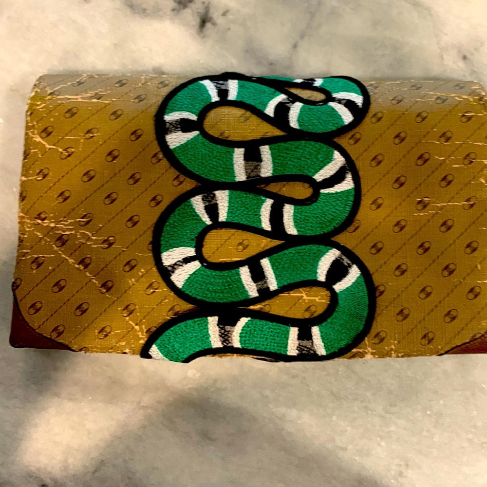 Reposhed Gucci Vintage Clutch. I added the snake.